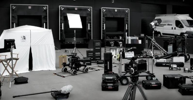 technician prepping camera and lights